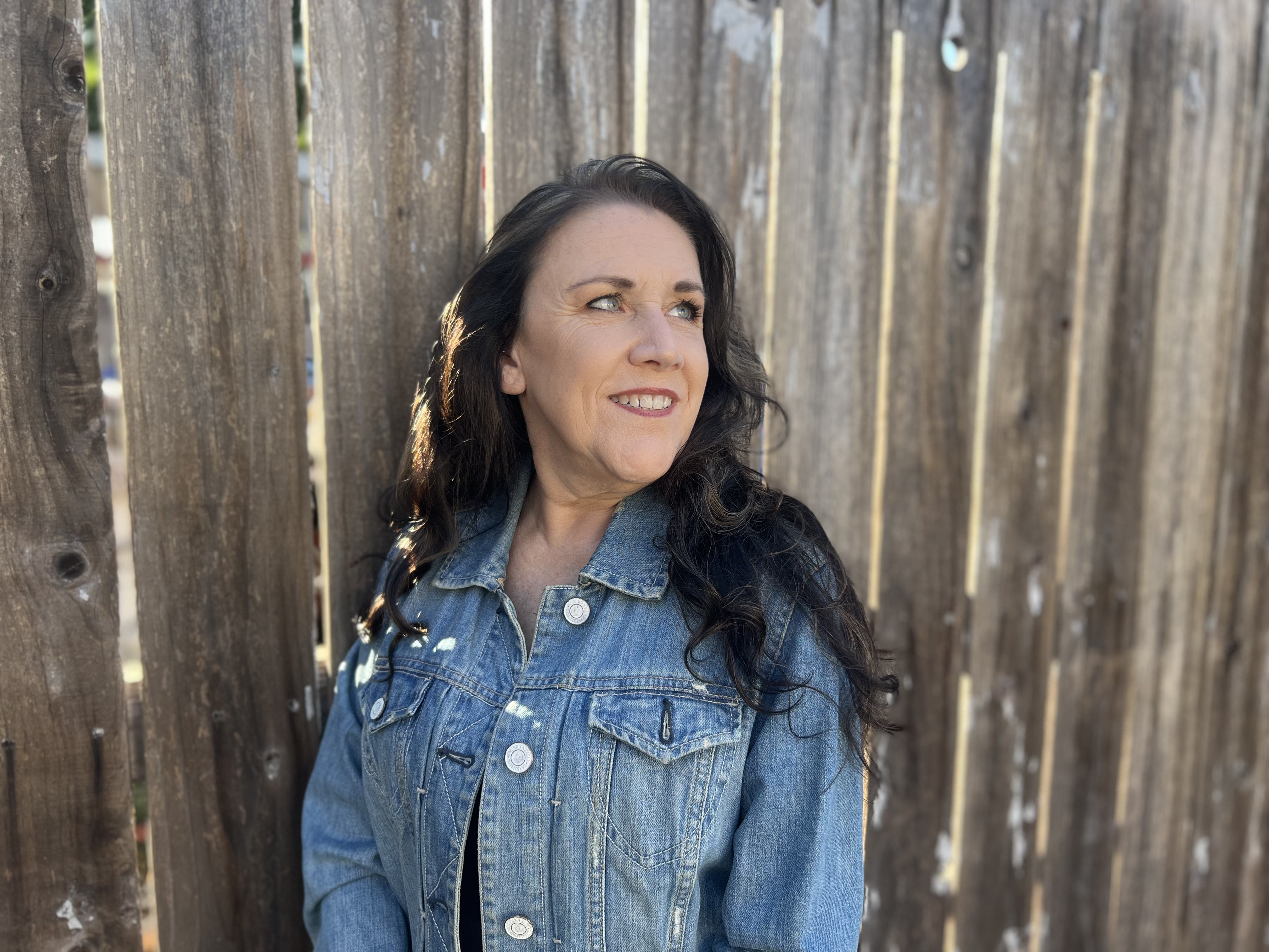Eva Gehlert outdoors in a denim jacket